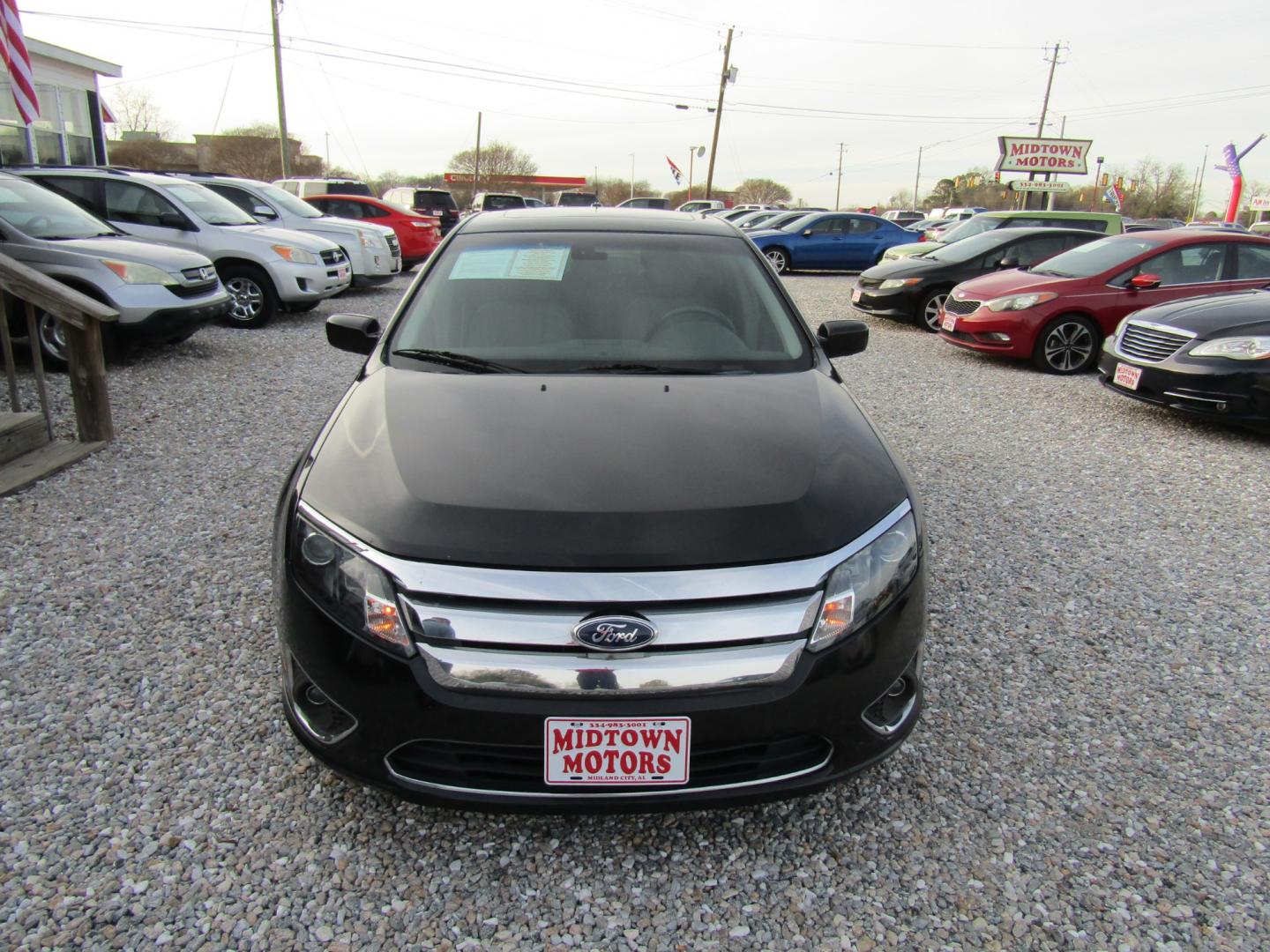 2011 Black /Tan Ford Fusion (3FAHP0JG4BR) , Automatic transmission, located at 15016 S Hwy 231, Midland City, AL, 36350, (334) 983-3001, 31.306210, -85.495277 - Photo#1